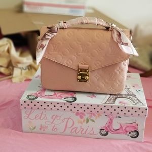 Pochette metis rose poudre